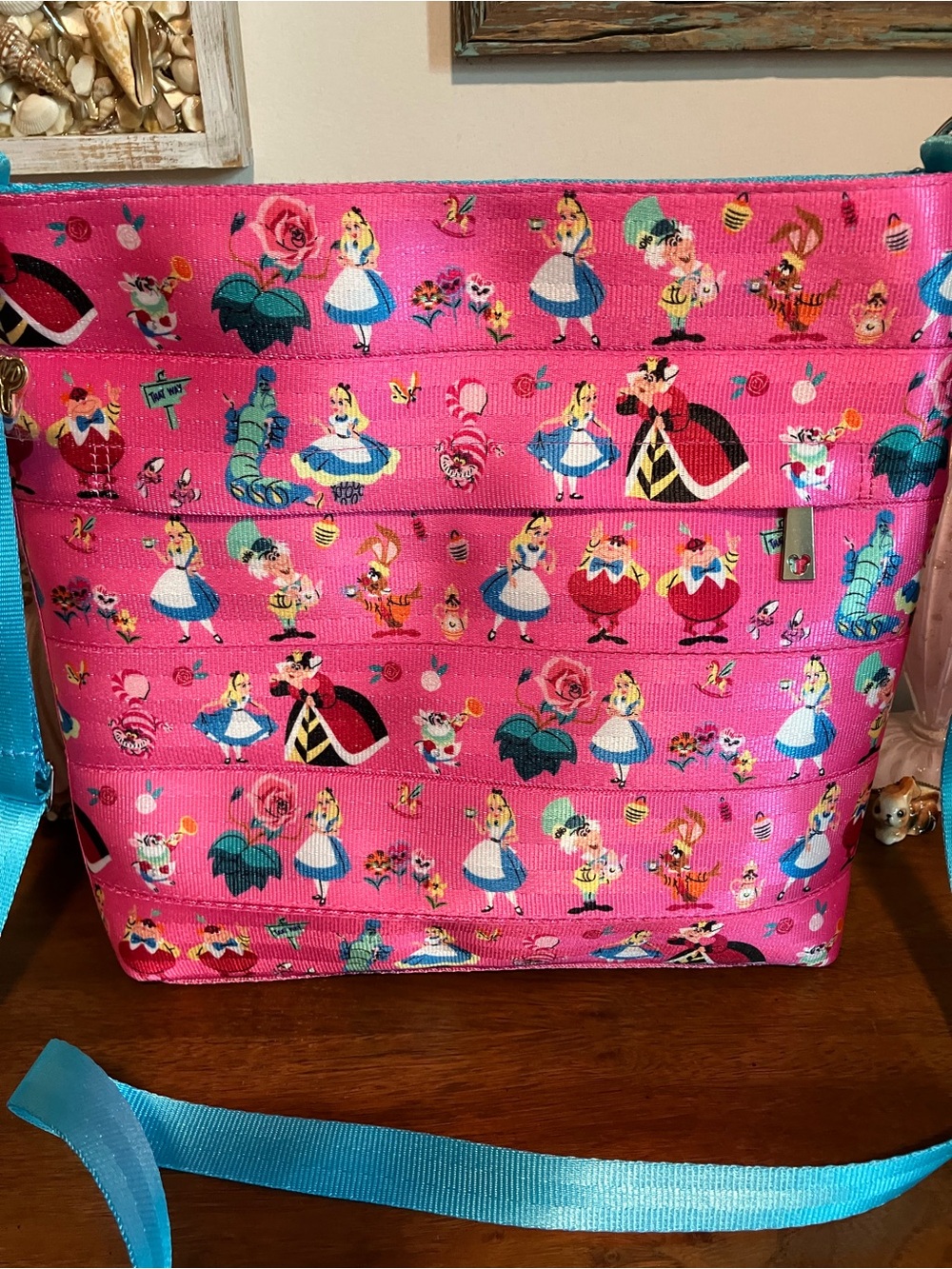 Harveys Seatbelt Disney Alice in Wonderland Pink Crossbody Bag with Blue Strap - Picture 3 of 6